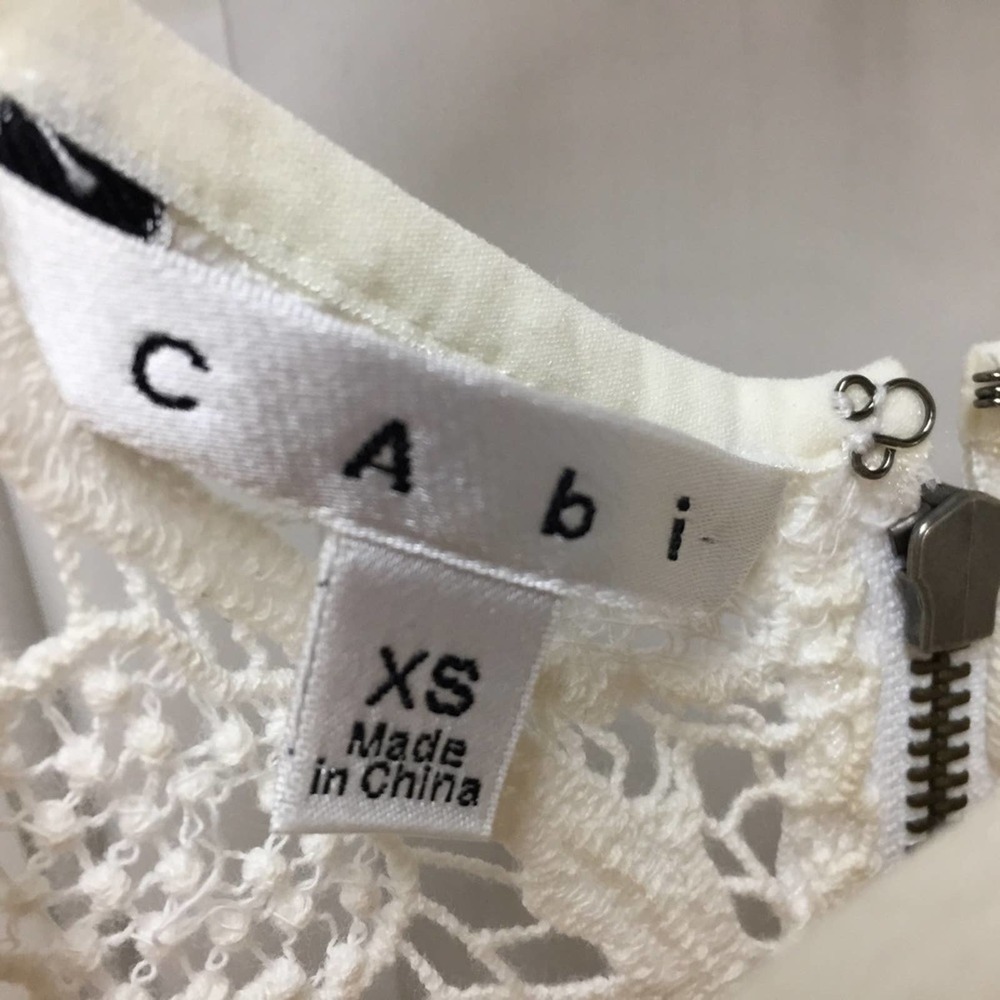 CAbi White Crocheted Lace Sheer Peplum Top - Picture 7 of 16